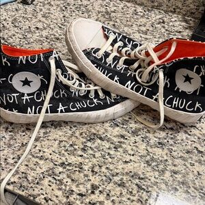 Black Canvas High-Top Sneakers with White Graphic Text